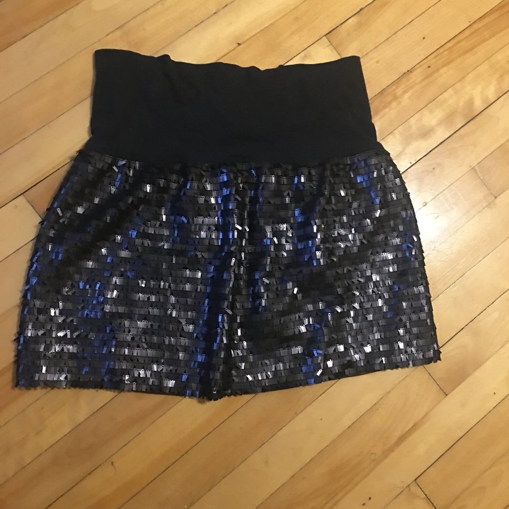Size Medium Skirt by BEBE M, knitwear band on top that can be folded - stretchy